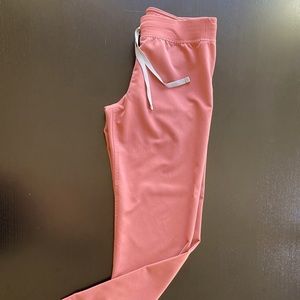 Mauve FIGS scrub pants.